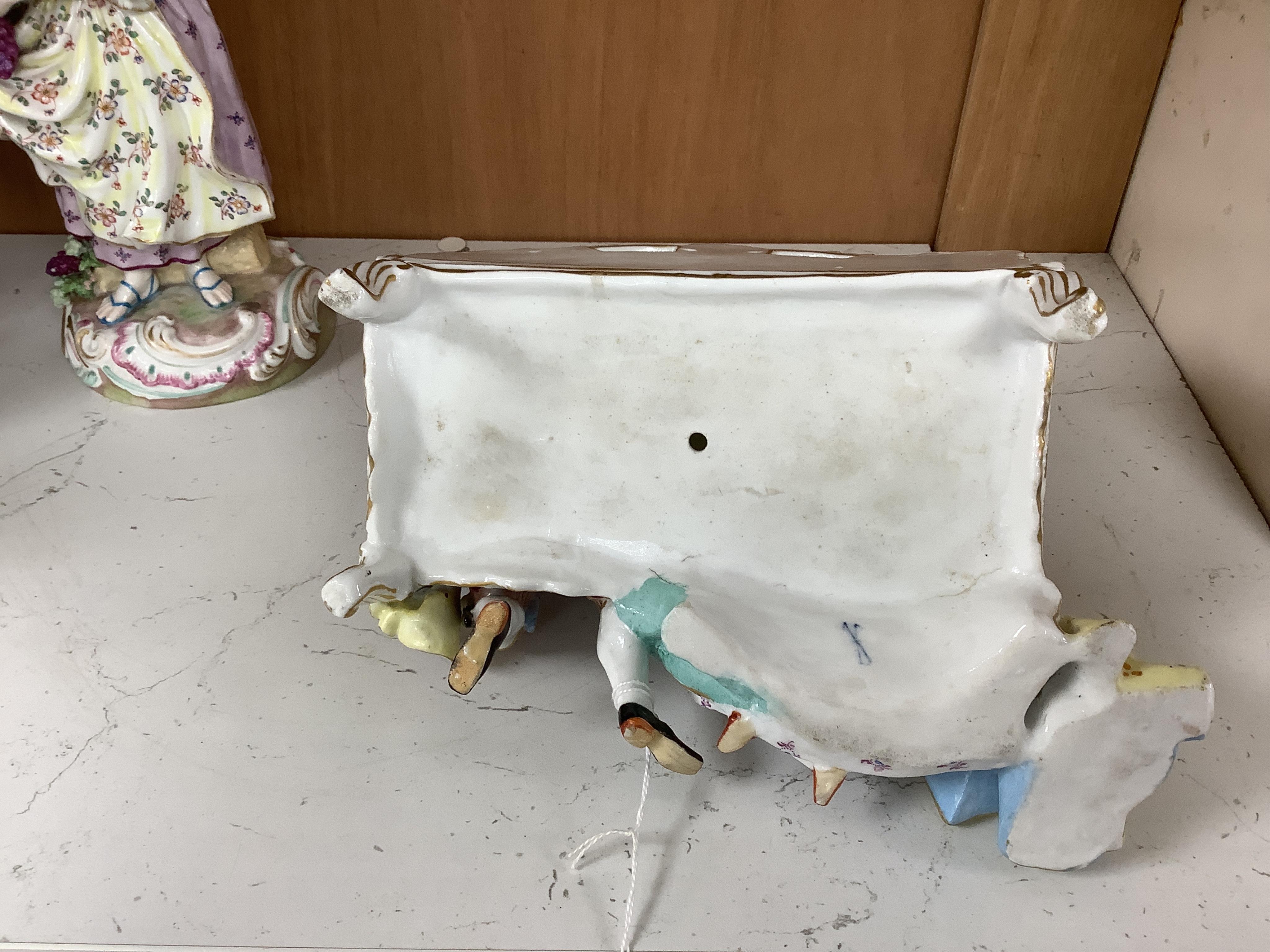 A Meissen style porcelain musical group, a figurine of a lady holding grapes and a two Derby figures of Summer and Autumn, c.1810-30, largest 24cm high